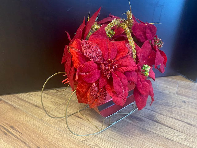 Santa Sleigh with Poinsetta Flowers