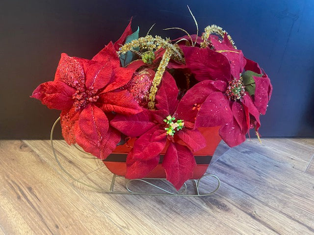 Santa Sleigh with Poinsetta Flowers