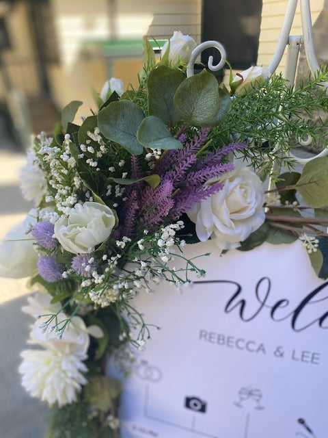 Lavender and white flower garland for Welcome Sign