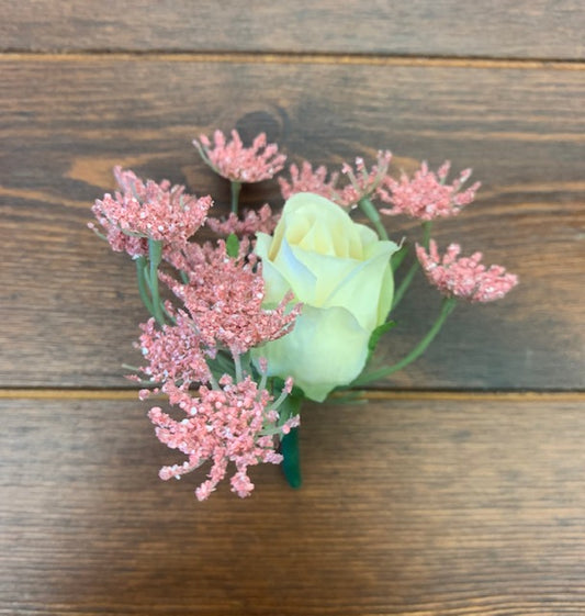 White dusty pink groom boutonniere