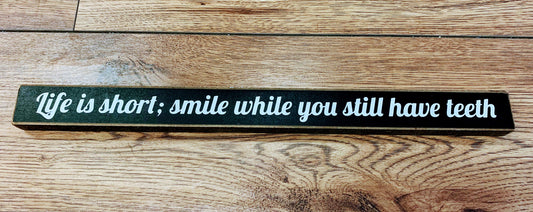 Smile while you still have teeth Sign